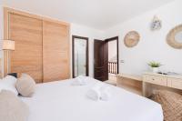 Postel nebo postele na pokoji v ubytování Karat Villa Atlántida