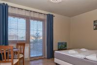 Posteľ alebo postele v izbe v ubytovaní Tatragolf Mountain Resort