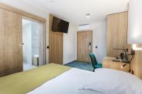 Posteľ alebo postele v izbe v ubytovaní Hotel Gromada Łomża