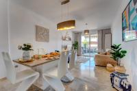 Posedenie v ubytovaní Modern apartment with large terrasse, bbq, fast wifi, 2 pools