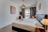 Posteľ alebo postele v izbe v ubytovaní Modern apartment with large terrasse, bbq, fast wifi, 2 pools