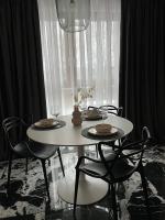 Reštaurácia alebo iné gastronomické zariadenie v ubytovaní Apartment by Gustav