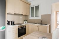 Kuchyňa alebo kuchynka v ubytovaní Groovy 2BR Apartment in Koukaki by UPSTREET