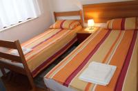 Łóżko lub łóżka w pokoju w obiekcie Apartment in Malinska - Insel Krk 43310