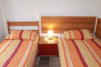 Łóżko lub łóżka w pokoju w obiekcie Apartment in Malinska - Insel Krk 43310