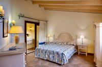 A bed or beds in a room at Apartment in Liscia di Vacca - Sardinien 43449
