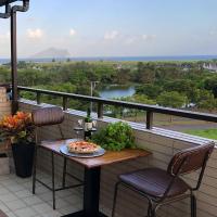 a table with a plate of food on a balcony at SoHo NewYork in Toucheng