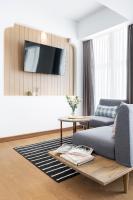 TV a/nebo společenská místnost v ubytování Darley Hotel Chiangmai