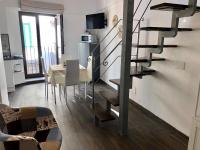A television and/or entertainment centre at Marechiaro House