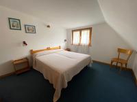 A bed or beds in a room at Residence Sci Sport