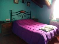 A bed or beds in a room at Hostal Venta Liara