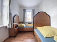 Postel nebo postele na pokoji v ubytování Stilvolle 2 Zimmer Wohnung mit Küche, TV, Waschmaschine