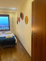 Posteľ alebo postele v izbe v ubytovaní Sunny Life Apartment