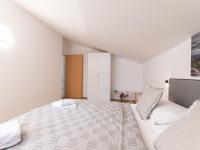 Łóżko lub łóżka w pokoju w obiekcie Apartment Alpenchalets-3 by Interhome