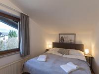 Łóżko lub łóżka w pokoju w obiekcie Apartment Alpenchalets-3 by Interhome