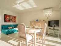 Telewizja i/lub zestaw kina domowego w obiekcie Apartment L'Escale by Interhome