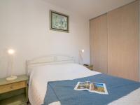 Łóżko lub łóżka w pokoju w obiekcie Apartment L'Escale by Interhome