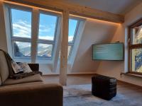 Televízia a/alebo spoločenská miestnosť v ubytovaní Apartment Bergschnucke Homes-6 by Interhome