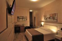 A television and/or entertainment centre at Hotel Lenotel