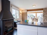 a kitchen with a stove and a counter top at Holiday Home La Plage by Interhome in Denneville