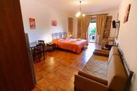 Posteľ alebo postele v izbe v ubytovaní Vathi Hotel