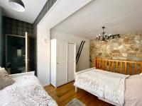 Posteľ alebo postele v izbe v ubytovaní Apartamenty Lux Willa Juras