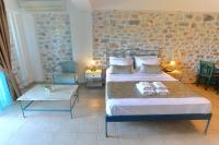 Posteľ alebo postele v izbe v ubytovaní Vathi Hotel