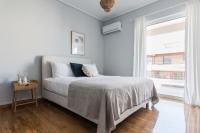 Posteľ alebo postele v izbe v ubytovaní Enjoyable 2BR Apartment in Marousi by UPSTREET