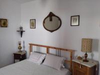 Posteľ alebo postele v izbe v ubytovaní Athena's Guest House