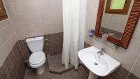 Łazienka w obiekcie Ξενώνας Μενελαΐς - Menelais Apartments