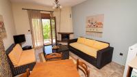 Telewizja i/lub zestaw kina domowego w obiekcie Ξενώνας Μενελαΐς - Menelais Apartments