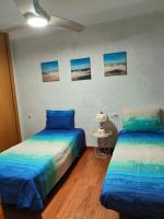 Posteľ alebo postele v izbe v ubytovaní Estrella azul/ Blue star