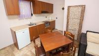Kuchnia lub aneks kuchenny w obiekcie Ξενώνας Μενελαΐς - Menelais Apartments