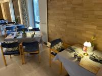 Posezení v ubytování Hotel Kreuzbergbaude beim Berzdorfer See mit Wohlfühl Sauna