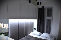 Postel nebo postele na pokoji v ubytování M-Keys Apartments Kraków Old Town Kazimierz