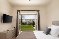 TV a/nebo společenská místnost v ubytování Villa Estelle by ILC (Istria Luxury Collection)