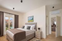 Postel nebo postele na pokoji v ubytování Villa Estelle by ILC (Istria Luxury Collection)