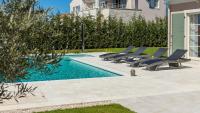 Der Swimmingpool an oder in der Nähe von Villa Grace by ILC (Istria Luxury Collection)