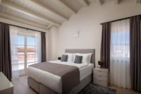 Ein Bett oder Betten in einem Zimmer der Unterkunft Villa Grace by ILC (Istria Luxury Collection)