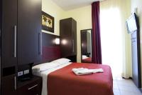 Posteľ alebo postele v izbe v ubytovaní Hotel Alibi
