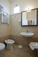 Kúpeľňa v ubytovaní Hotel Alibi