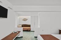 Postel nebo postele na pokoji v ubytování Erofili Beach Hotel