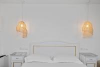 Postel nebo postele na pokoji v ubytování Erofili Beach Hotel