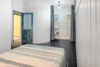 A bed or beds in a room at Las Sales Duplex