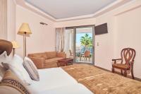 Postel nebo postele na pokoji v ubytování Palazetto Suites Zakynthos - Adults Only