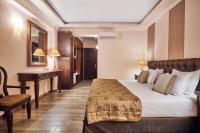 Postel nebo postele na pokoji v ubytování Palazetto Suites Zakynthos - Adults Only