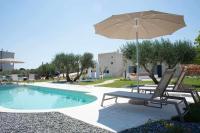 The swimming pool at or close to Dimora Maria Charming Home