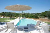 The swimming pool at or close to Dimora Maria Charming Home