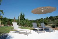 A garden outside Dimora Maria Charming Home