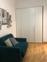 A seating area at confortevole appartamento per 5 persone a Portuense